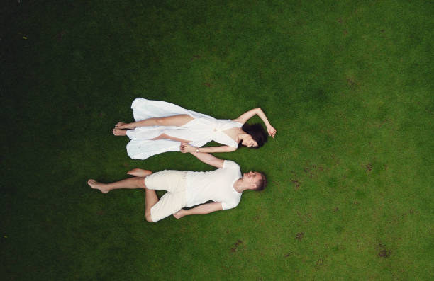 istock Couple lie on a graas on a Bali 1277259685