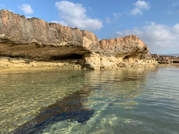 istock Sea and rocks blue sky 1277261948