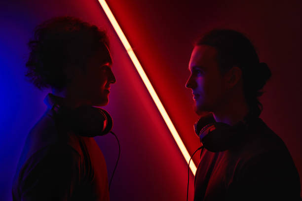 istock Two gamers in dark room 1277262741