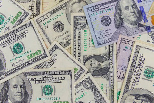 istock Background of different us dollar banknotes 1277269038