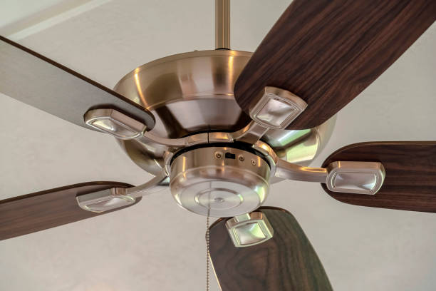 istock Standard ceiling fan with built in lights five blade design and metal downrod 1277269215