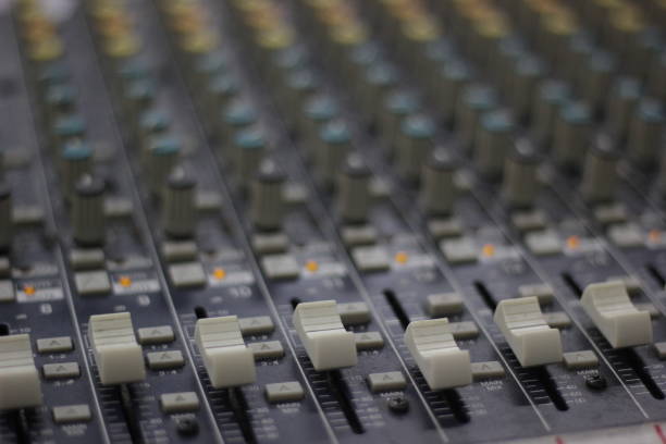 istock Buttons and sliders of a sound mixer table 1277272150