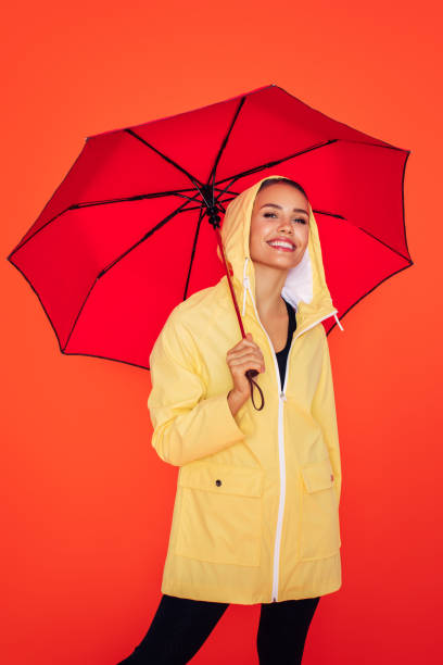 istock Girl with an umbrella 1277272237