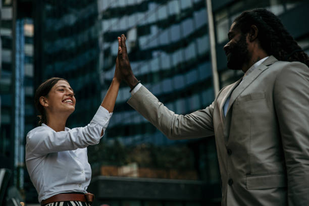istock Dream team high fiving each other 1277273304