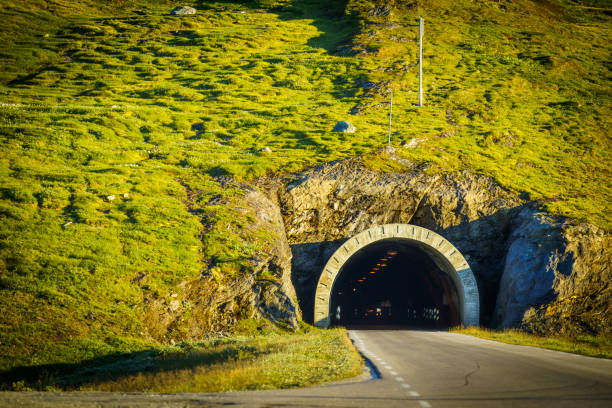 istock Road with tunnel in mountains Norway 1277279557