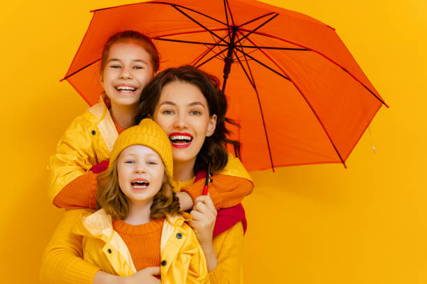 istock Family with red umbrella 1277280855