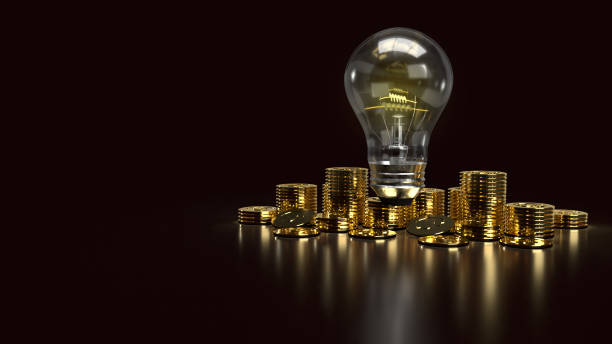 istock light bulb and gold coins in the dark for idea or business content 3d rendering. 1277281199