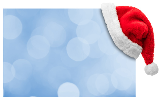 Santa Hat hanging on a blue defocused lights card (isolated on a white background). You can add you message to the center.