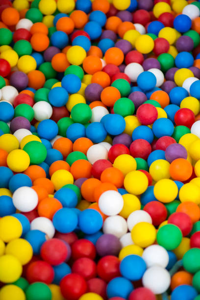 istock Many colorful toy ball in heap 1277285681