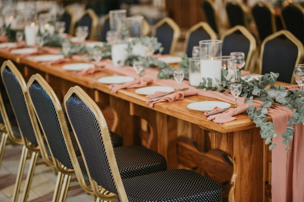 istock Wedding table setting in a restaurant decorated with flowers and candles 1277285890