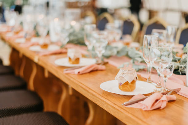 istock Beautiful wedding table setting decorated with flowers and candles 1277285934
