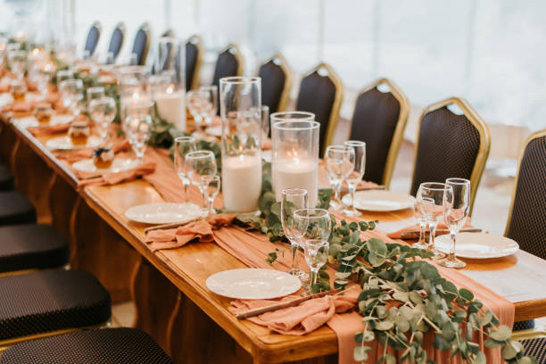 istock Beautiful wedding table setting decorated with flowers and candles 1277285951