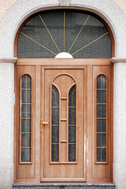 istock Old wooden front door , fanlight, arch. 1277286667