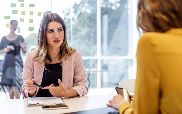 istock Business women having a meeting 1277288269