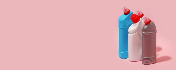 istock Cleaning product plastic container for house clean on pink pastel backgrpund, copy space, flyer, banner, coupon for house cleaning sirvice company 1277288640