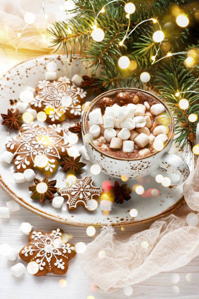 istock Christmas gingerbread cookies  with hot chocolate and marshmallows 1277293647