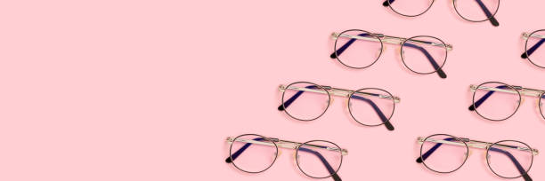 istock Frame made of eyeglasses layout on a pink pastel background. 1277294929