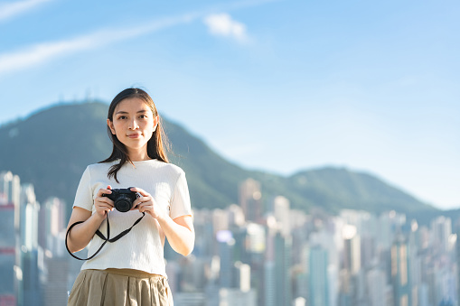 Young Asian woman traveler in hong kong