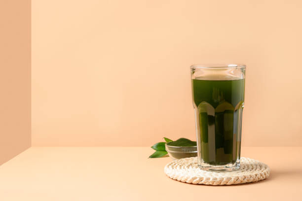 istock Chlorella healthy beverage in glass on a grey background. 1277296556