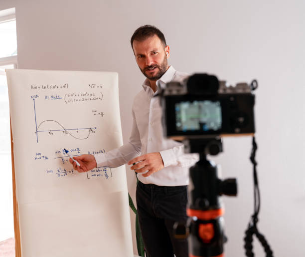istock One male professor holding online class for e-learning students during coronavirus pandemic period. 1277297208