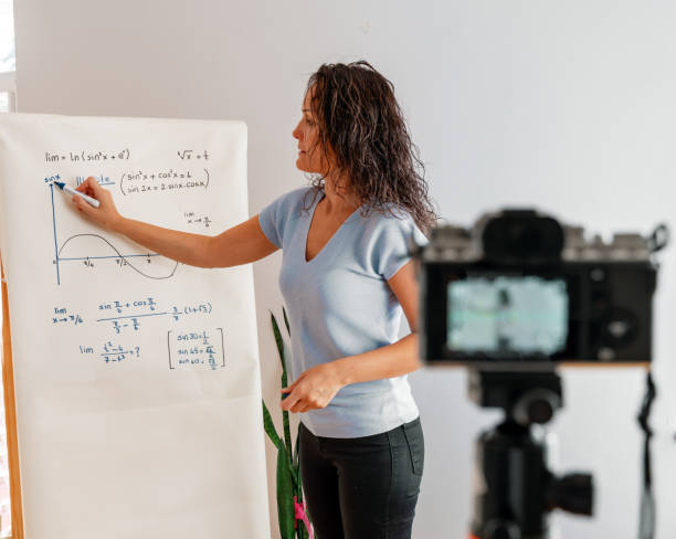istock One young female professor holding online class for e-learning students during coronavirus pandemic period. 1277297210