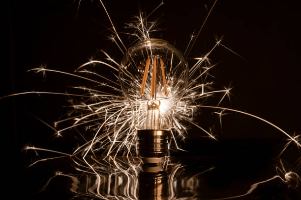 istock Fireworks sparkler showing through LED light bulb 1277297278