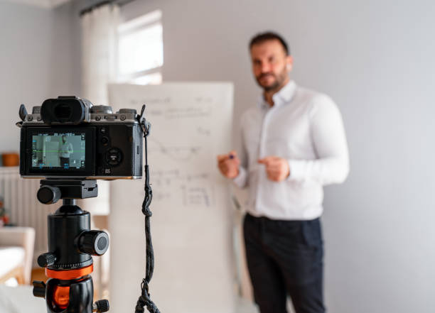 istock One male professor holding online class for e-learning students during coronavirus pandemic period. 1277297648