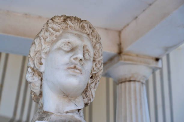 closeup of head of ancient marble statue of greek man on a street. kos island, greece - mythology marble close up architecture imagens e fotografias de stock