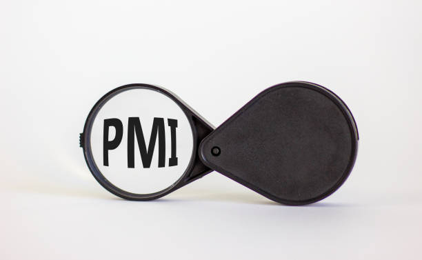 istock Magnifying glass with text 'PMI' - 'Purchasing Managers Index' on beautiful white background. Business concept, copy space. 1277301105