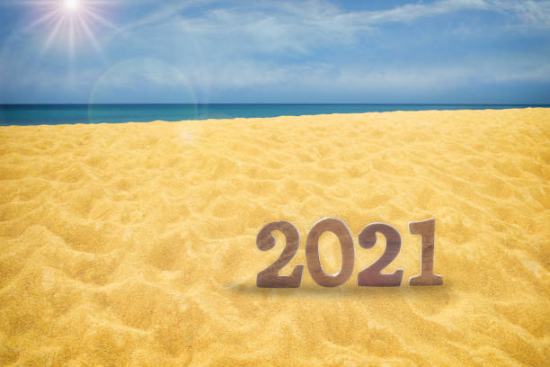 istock New year 2021 on tropical beach with sunlight 1277304486