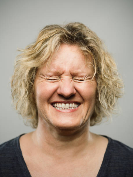 portrait of a real caucasian adult woman with excited expression and eyes closed - 2586 imagens e fotografias de stock