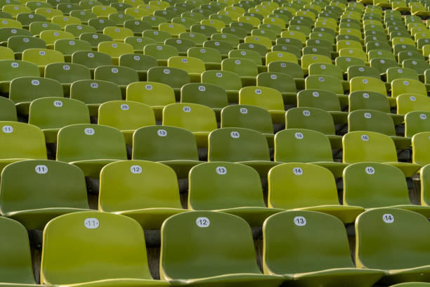 istock endless rows of enpty chairs in a stadium 1277306620