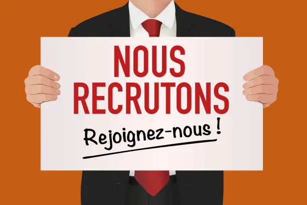 Vector illustration of A man holds a sign with a recruitment announcement on it.