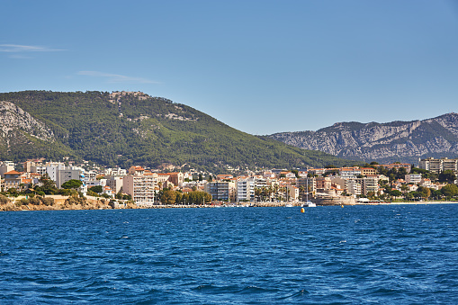 Toulon, France - September 01,2020: View of the beach at Toulon with the mountains in the background.