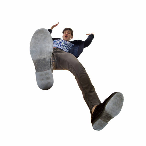 istock Girl is falling on isolated white background. 1277313517