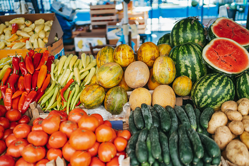 Different varieties of fresh vegetables at a farmer's market, organic food and healthy lifestyle concept