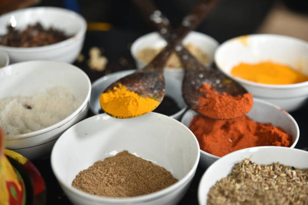 istock Various spice on wooden spoons with herbs 1277316773