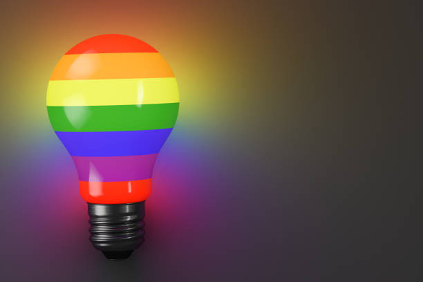 istock Glowing electric lamp with LGBT symbols. Copy space. 1277317409