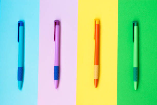 istock Ballpoint pens on a colorful background. 1277319686