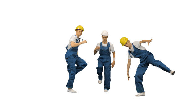 istock Three male construction workers in hard hats hoping into the cam 1277320821