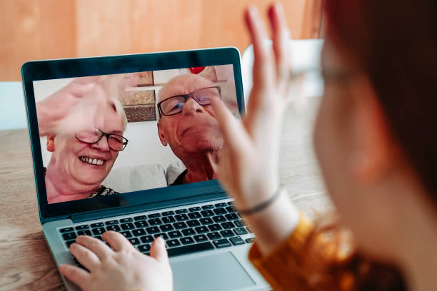istock Girl talking with grandparents on video call 1277322807