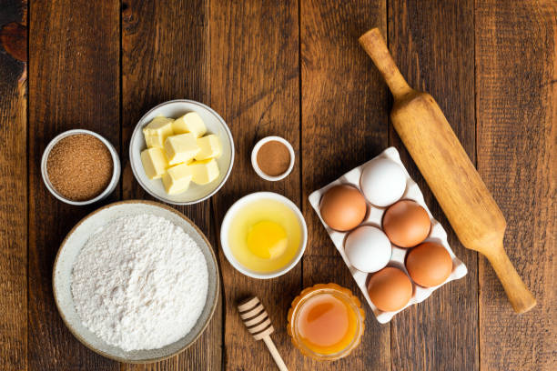 istock Ingredients for baking on wooden table background 1277323523