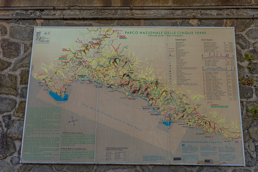 Monterosso, Cinque Terre, Italy - 26 June 2018: Display board showing the fishing villages of cinque terre at Monterosso al mare, Cinque Terre, Italy