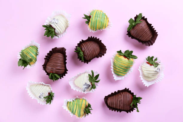 istock Beautiful desert with berries covered in chocolate. 1277325421