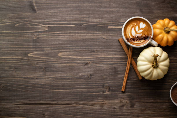 istock Pumpkin spice latte on a wooden background 1277325982