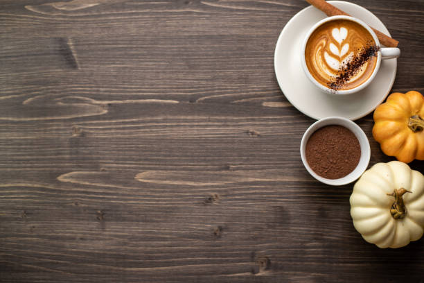 istock Pumpkin spice latte on a wooden background 1277326004