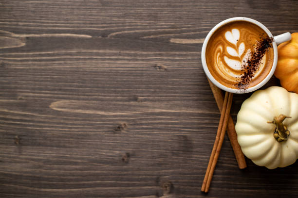 istock Pumpkin spice latte on a wooden background 1277326024