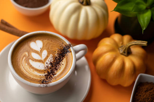 istock Pumpkin spice latte on a orange background 1277326034