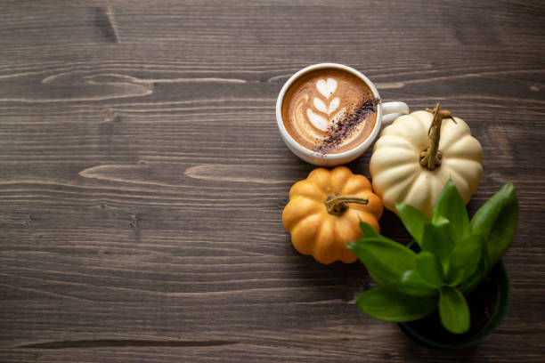 istock Pumpkin spice latte on a wooden background 1277326071