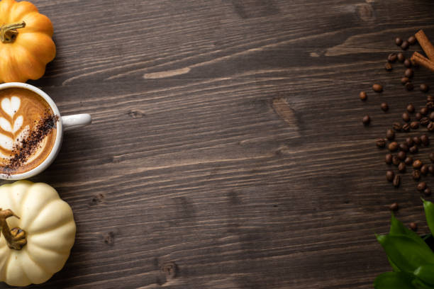 istock Pumpkin spice latte on a wooden background 1277326083